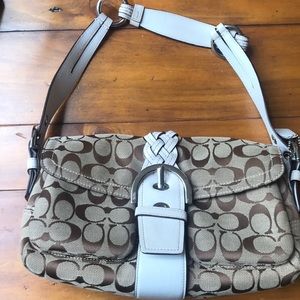 Tan and white leather Coach bag. Very lightly used
